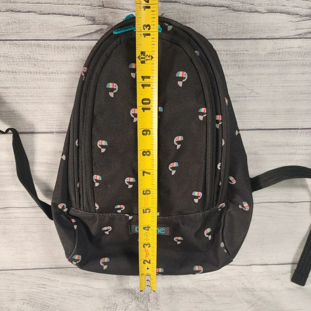 Dakine Cosmo 6.5L Mini Backpack Black Rainbow Toucan Pattern 8210060 Daypack